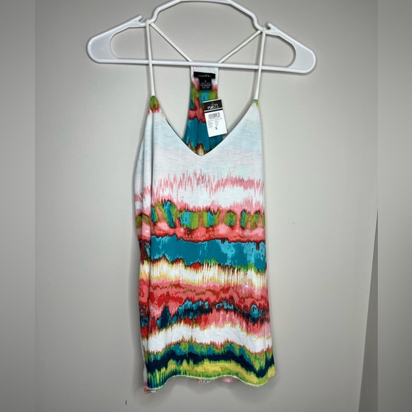 Rue21 Tops - NEW w/tag. Rue 21 flowy tank top. Size small. 3/4 fabric liner.